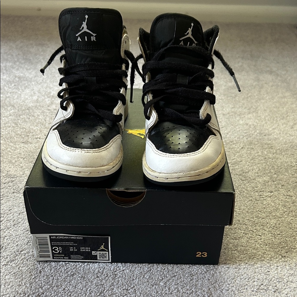 Air Jordan 1 Mid - Kids Black and White Sneakers